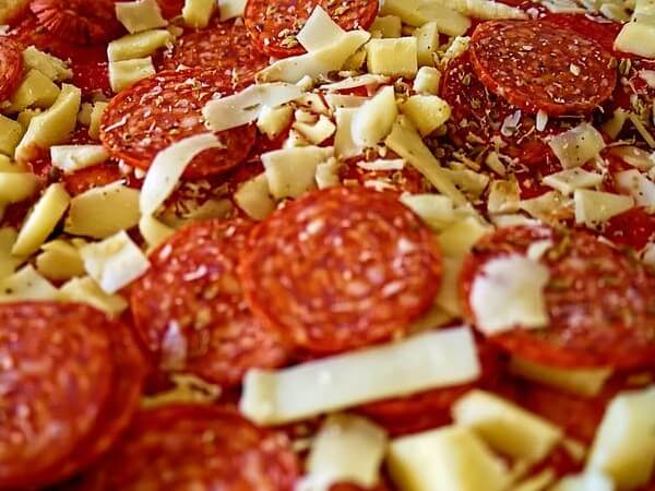 is pepperoni dangerous for dogs